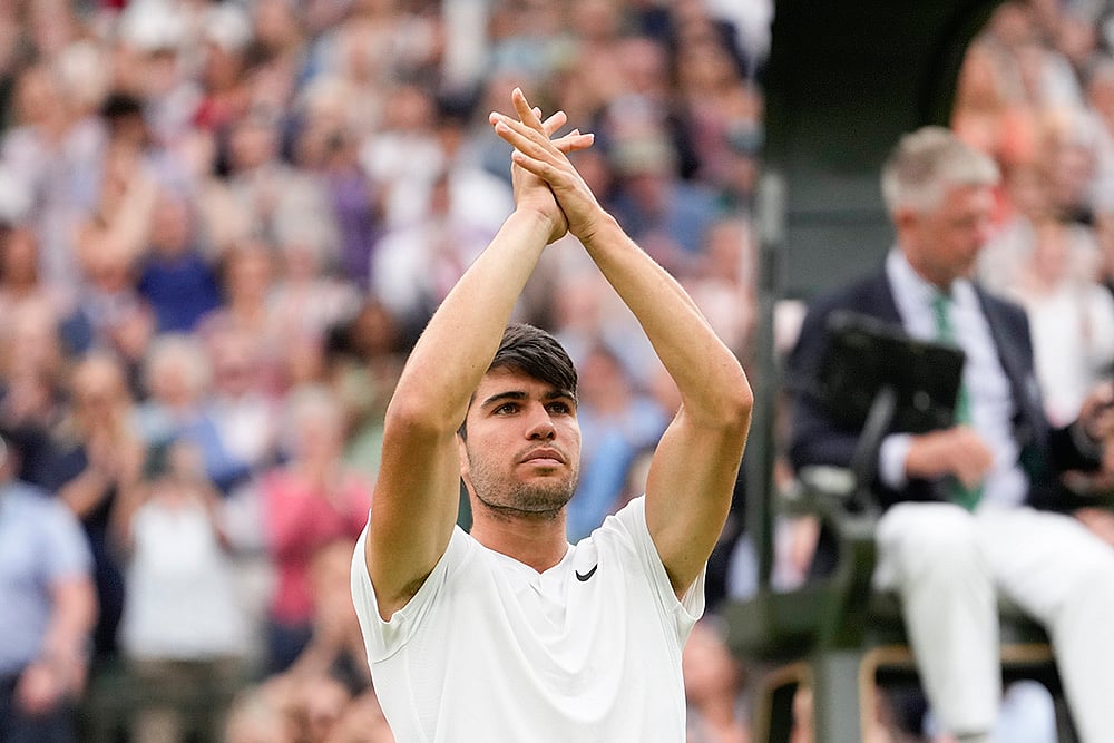 | Photo: AP/Alberto Pezzali : Carlos Alcaraz reacts after defeating Ugo Humbert